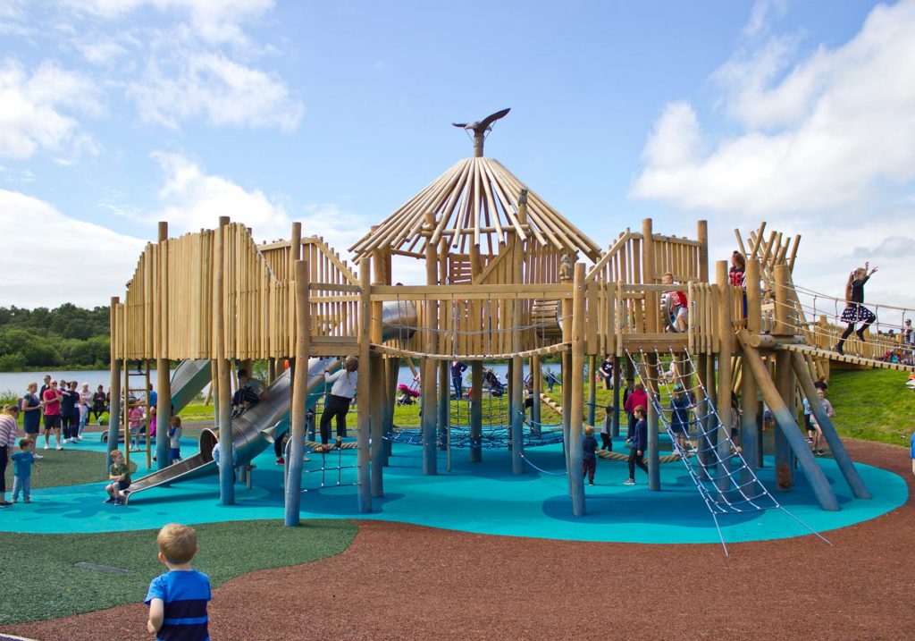 An image of a large play area we created with a huge custom jungle gym