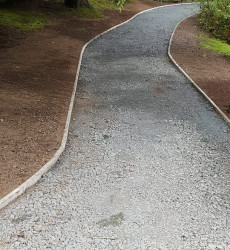 An image of a landscaping job we did with paving through a modern complex