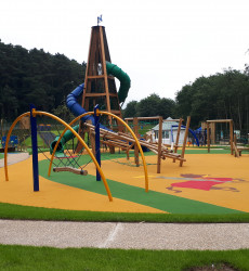 Childrens play park with swings and slides