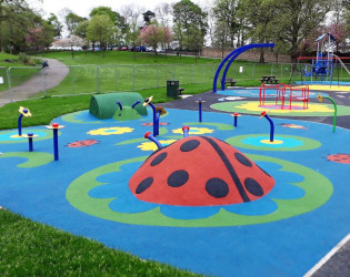 Colourful bug themed childrens play area